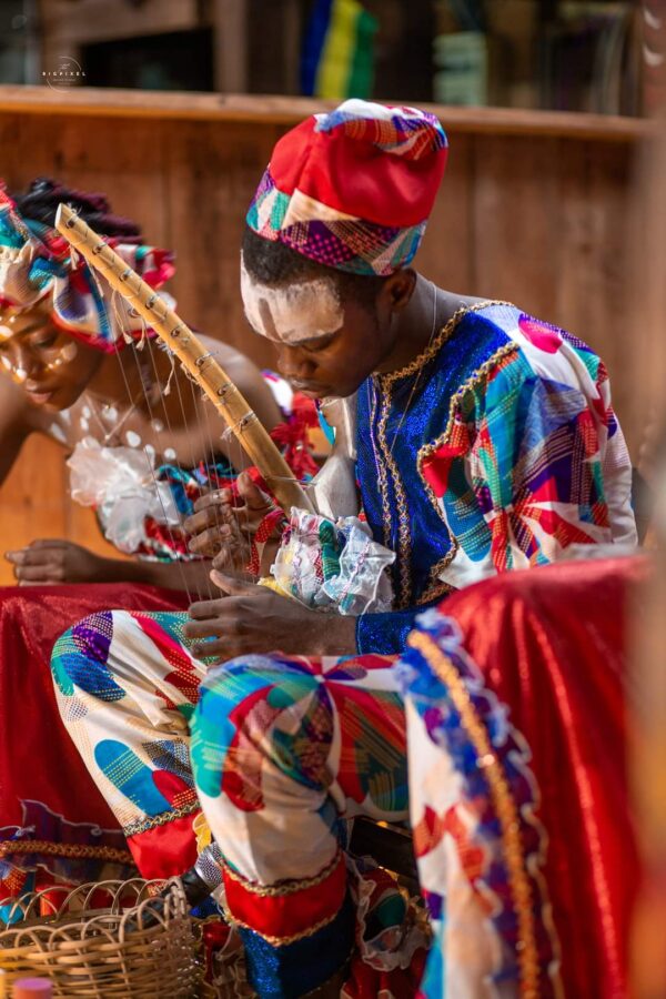 Traditional Ngombi player in ceremonial dress